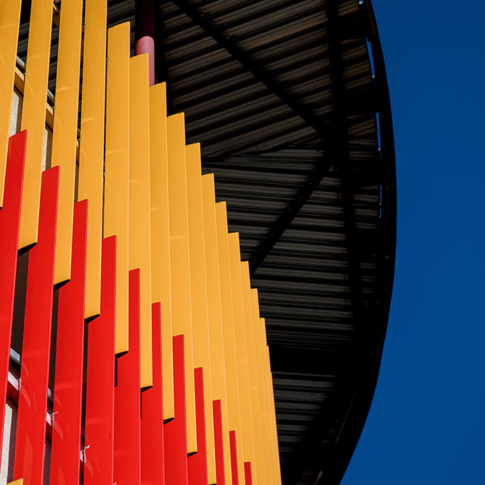 Powder-coated architectural panels showcasing vibrant colour options for commercial and industrial applications.