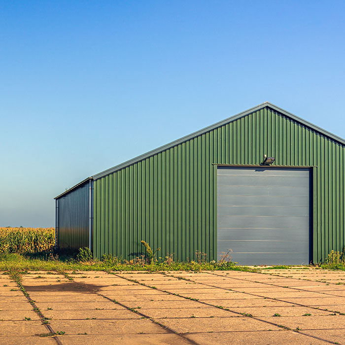 Powder-coated metal building exterior providing long-lasting colour retention and weather resistance.