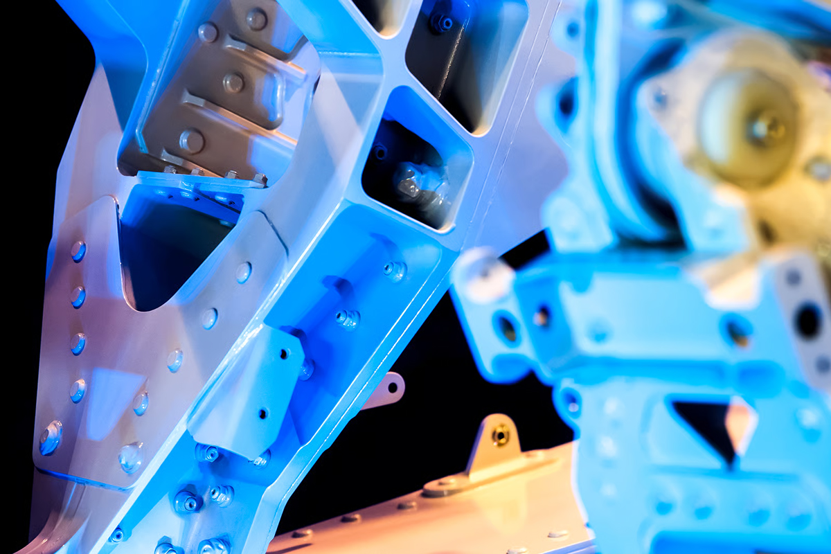 Close-up of powder coated industrial metal components showing smooth, durable protective finish applied through the powder coating process.