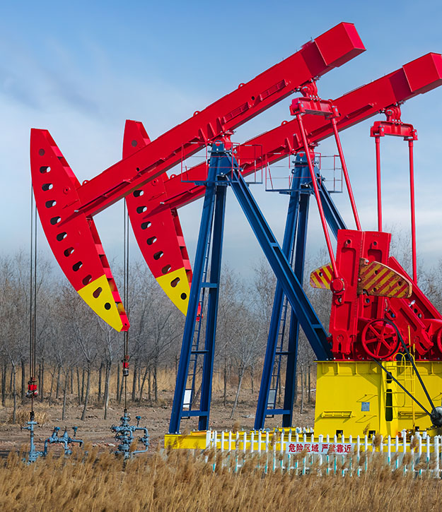 Oilfield pumpjacks featuring durable powder-coated finishes that reduce maintenance requirements and extend service life.